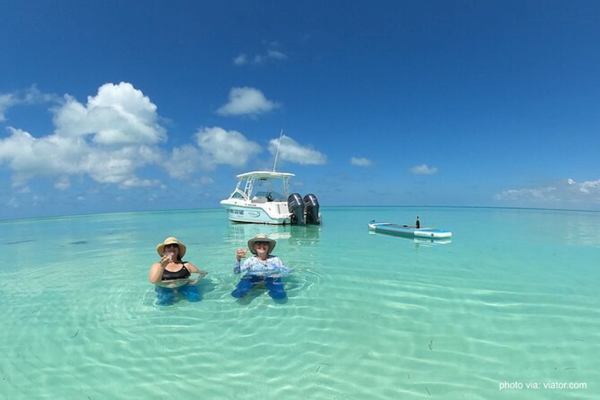 Turquoise, Key West sandbar with boat and people